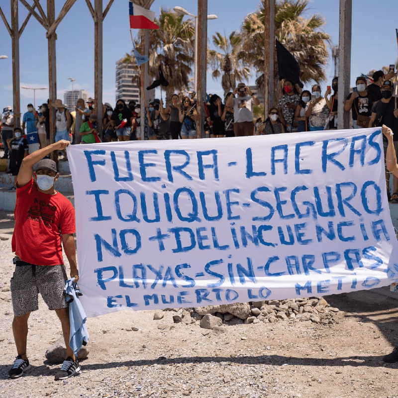 Comunidad boliviana se une a marcha contra delincuencia e inmigración ilegal en Iquique